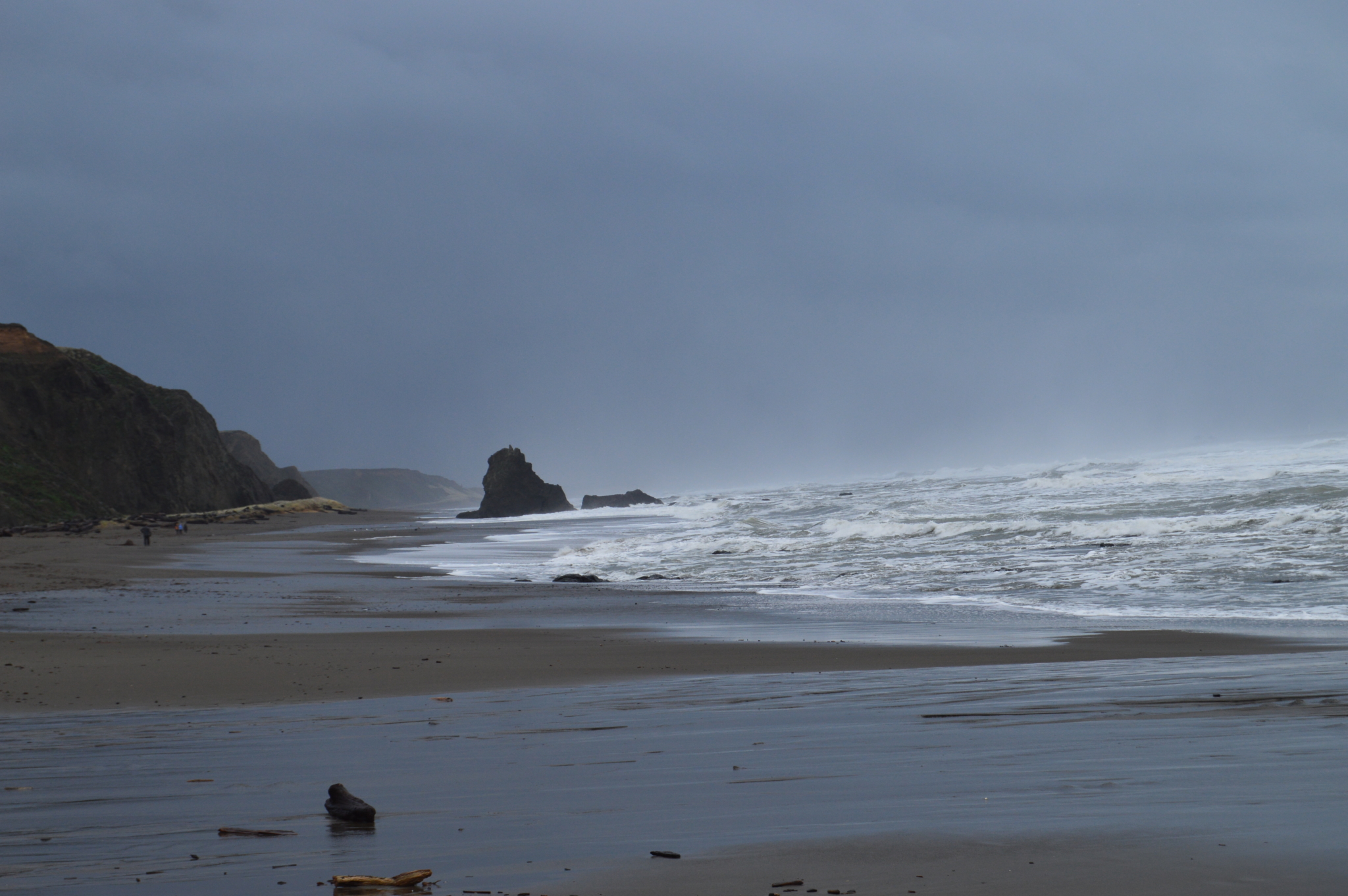 Rough ocean waves crashing into shore in California