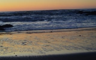 California sandy beach at sunset