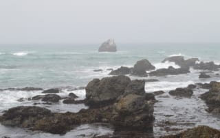 Rocky Northern California shore line on a foggy day.